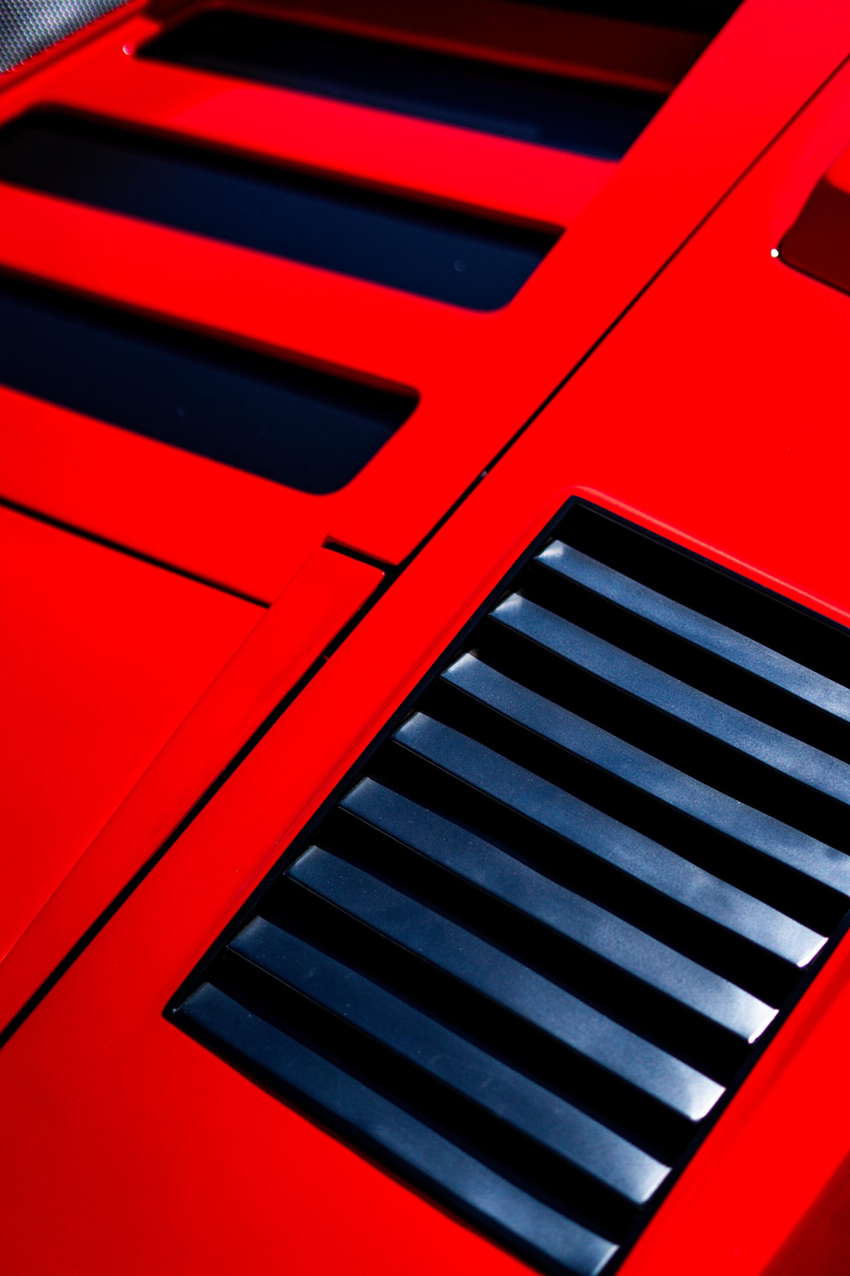 Abstract close-up of car ventilation grilles, emphasizing sleek design elements from The I.C.E. St. Moritz 2023 event